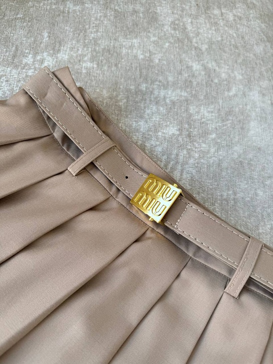 Женская юбка миди MIU MIU бежевого цвета