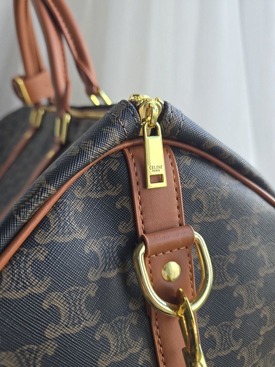 Кожаная дорожная сумка Celine Triomphe 50x26 см