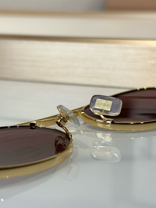Женские солнцезащитные очки MIU MIU Oval