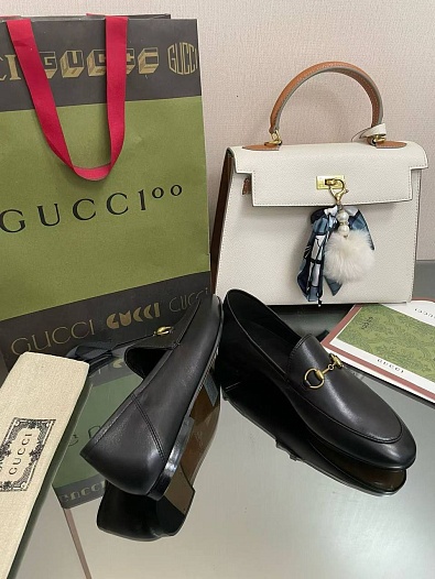 Женские кожаные лоферы Gucci чёрного цвета   