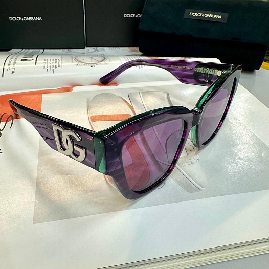 Женские сонцезащитные очки  Dolce & Gabbana фиолетового цвета   