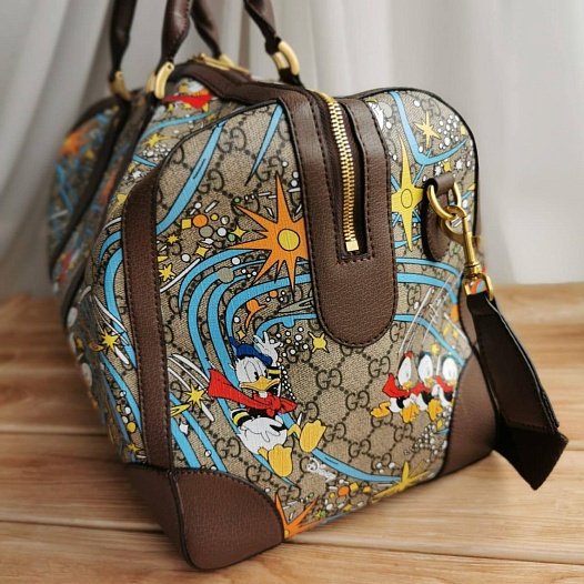 Дорожная кожаная сумка Gucci Disney GG Supreme 45x28 см   