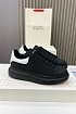 Кожаные кроссовки Alexander McQueen чёрного цвета