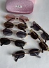 Женские солнцезащитные очки MIU MIU Oval