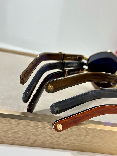 Солнцезащитные очки Cartier   