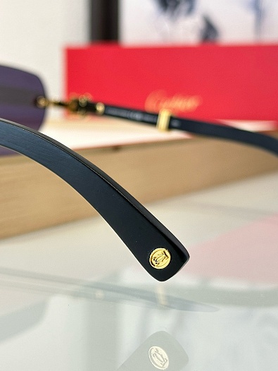 Солнцезащитные очки Cartier   