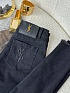 Женские джинсы Yves Saint Laurent чёрного цвета