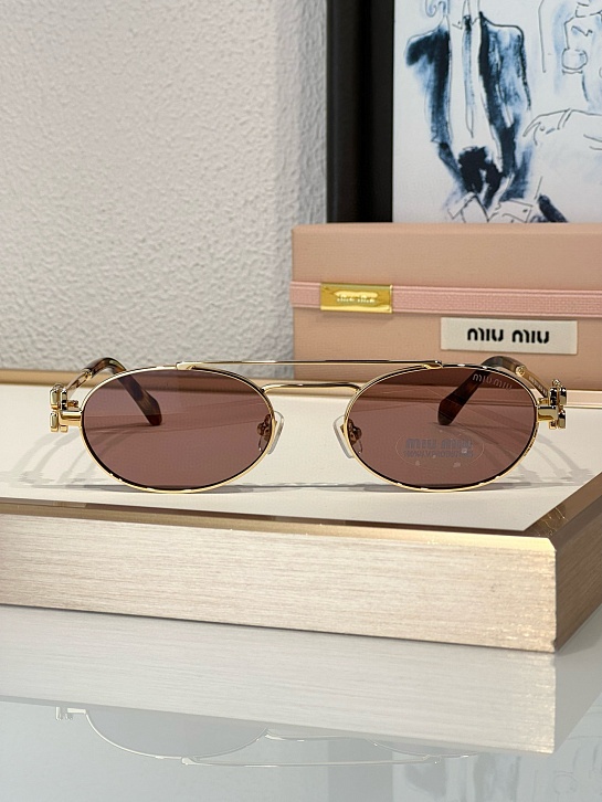 Женские солнцезащитные очки MIU MIU Oval