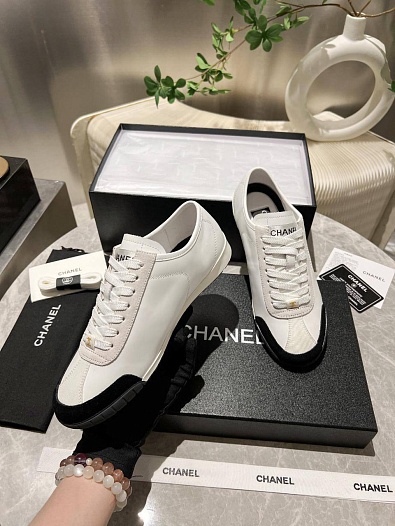 Женские кожаные кроссовки Chanel белого цвета   