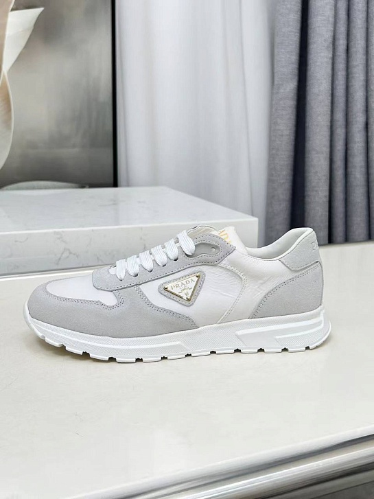 Женские комбинированные кроссовки Prada