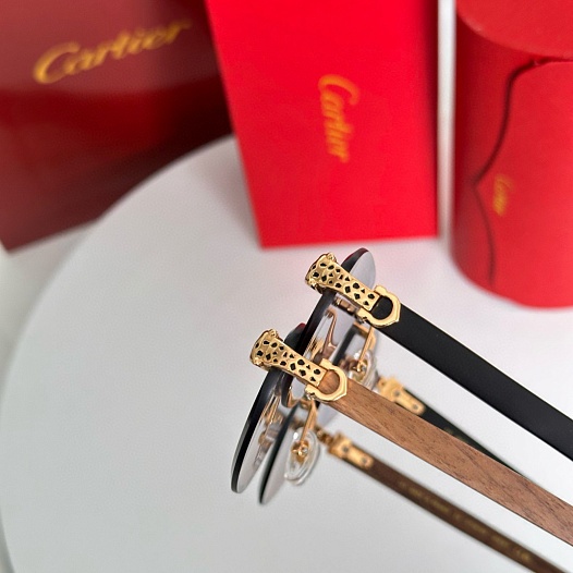 Солнцезащитные очки Cartier   