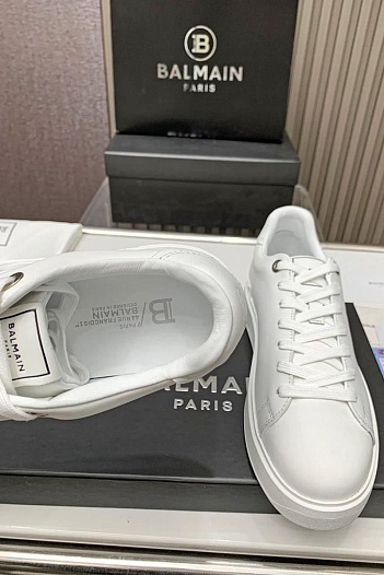 Кожаные кроссовки Balmain белого цвета   
