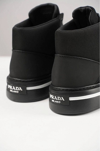 Комбинированные кроссовки с мехом Prada   