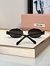 Женские солнцезащитные очки MIU MIU Oval