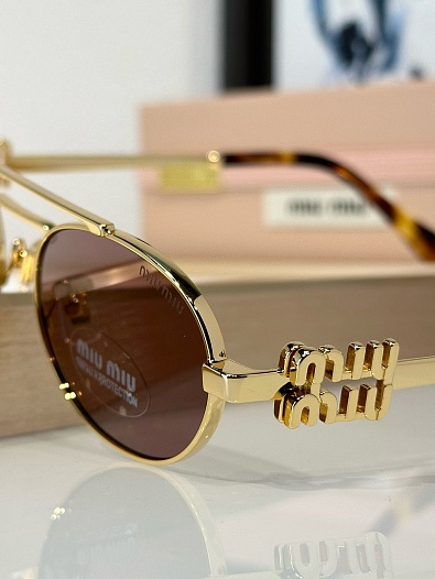 Женские солнцезащитные очки MIU MIU Oval   