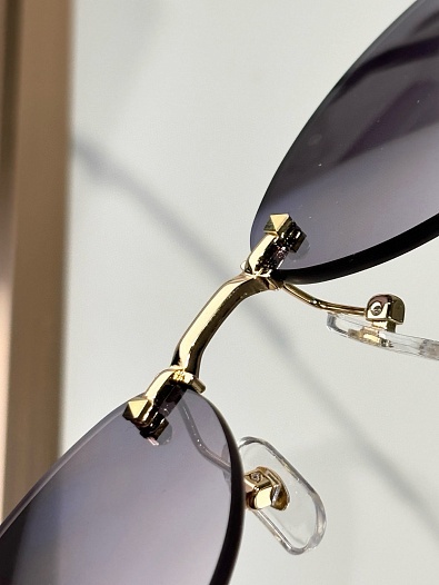 Солнцезащитные очки Cartier   