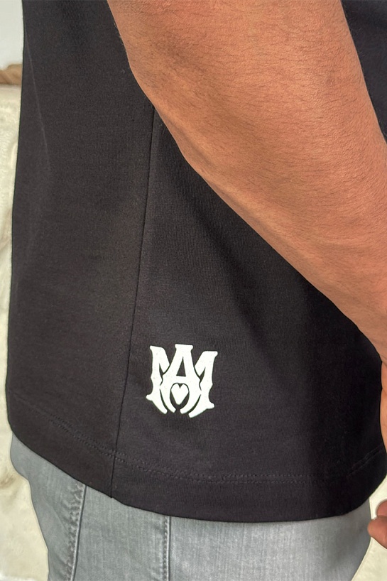 Футболка чёрного цвета Amiri staggered logo