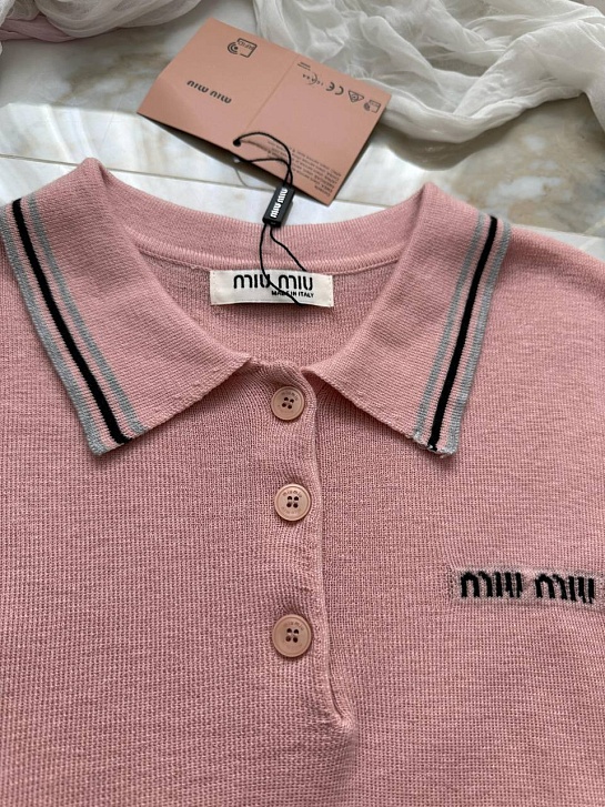 Женское поло розового цвета MIU MIU