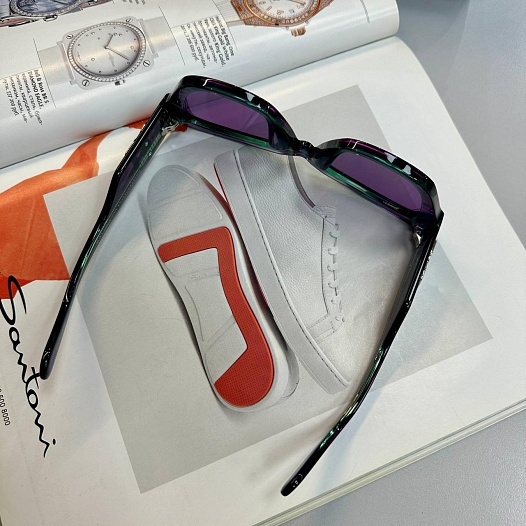 Женские сонцезащитные очки  Dolce & Gabbana фиолетового цвета   