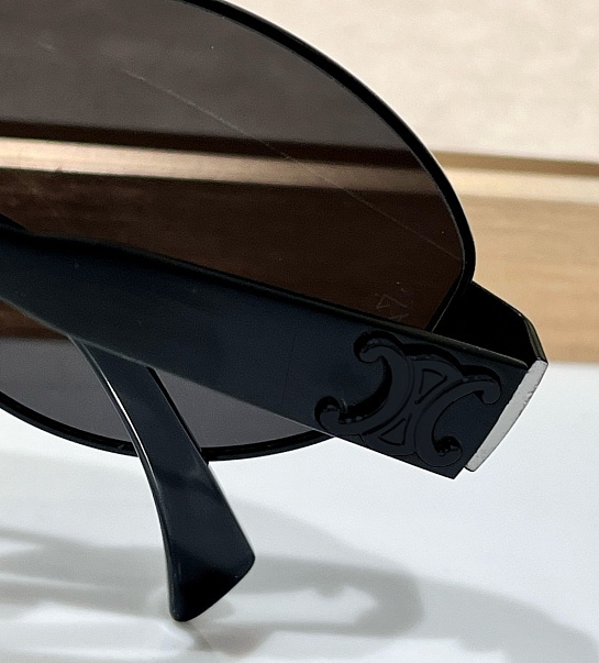 Солнцезащитные очки Celine Triomphe Metal