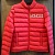 Мужской брендовый пуховик Moncler красного цвета