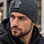 Мужская брендовая шапка Moncler серого цвета