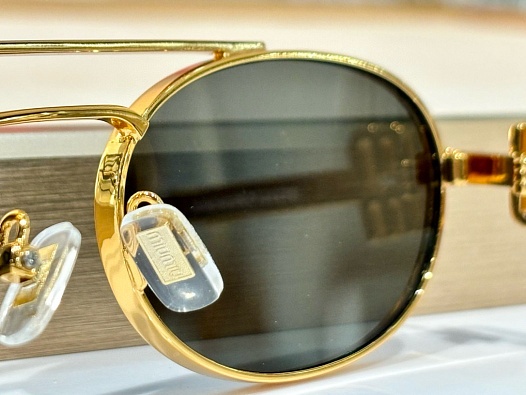 Женские солнцезащитные очки MIU MIU Oval   