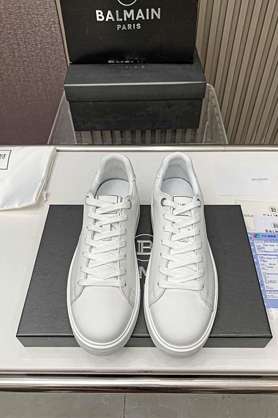 Кожаные кроссовки Balmain белого цвета