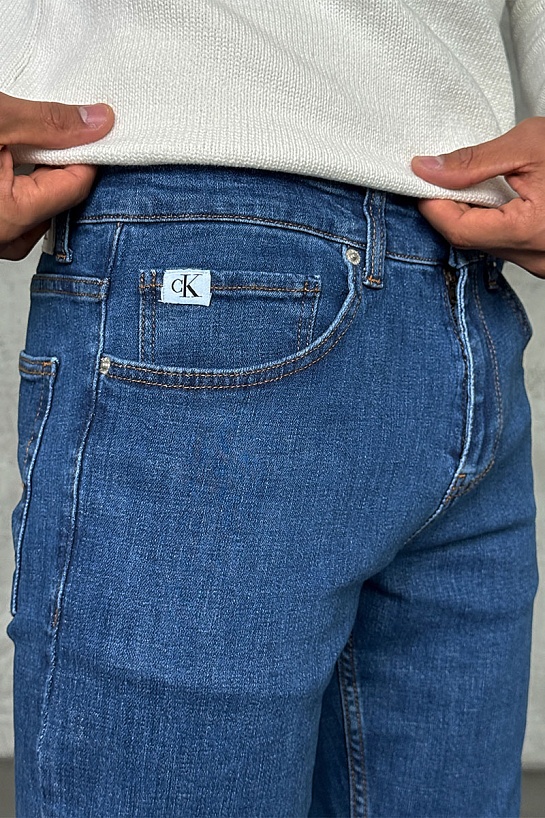 Джинсы синего цвета Calvin Klein