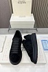 Замшевые кроссовки Alexander McQueen чёрного цвета