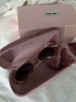 Женские солнцезащитные очки MIU MIU Oval