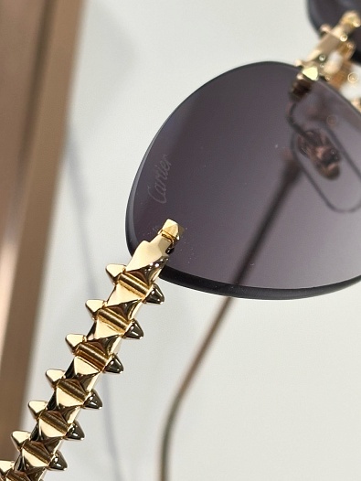 Солнцезащитные очки Cartier   