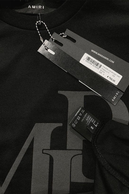 Футболка белого цвета Amiri staggered logo