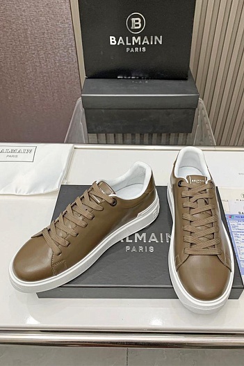 Кожаные кроссовки Balmain бежевого цвета   