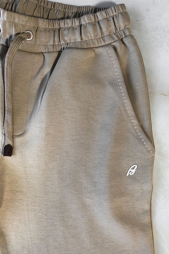 Мужские штаны Brioni бежевого цвета