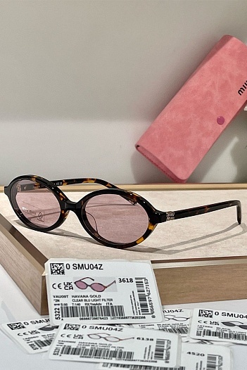 Солнцезащитные очки MIU MIU с леопардовой оправой   