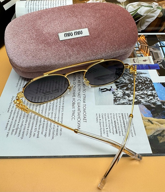 Женские солнцезащитные очки MIU MIU Oval