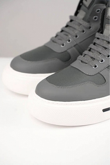 Комбинированные кроссовки с мехом Prada   