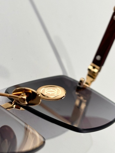 Солнцезащитные очки Cartier   
