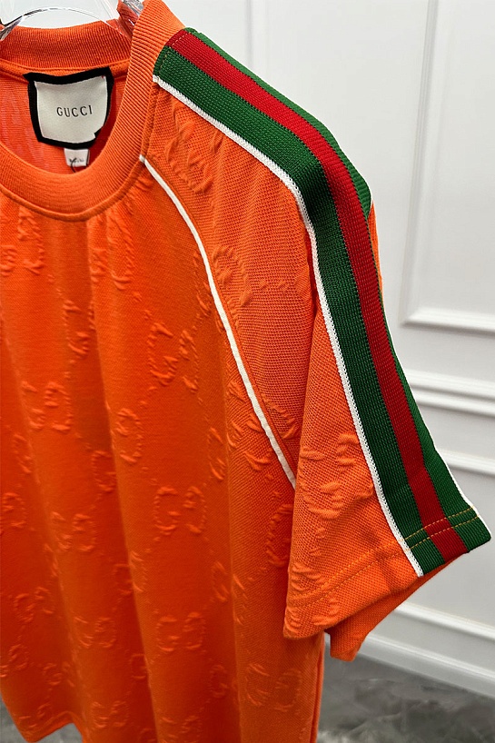 Оранжевая оверсайз футболка Gucci logo all-over embossed