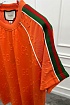 Оранжевая оверсайз футболка Gucci logo all-over embossed