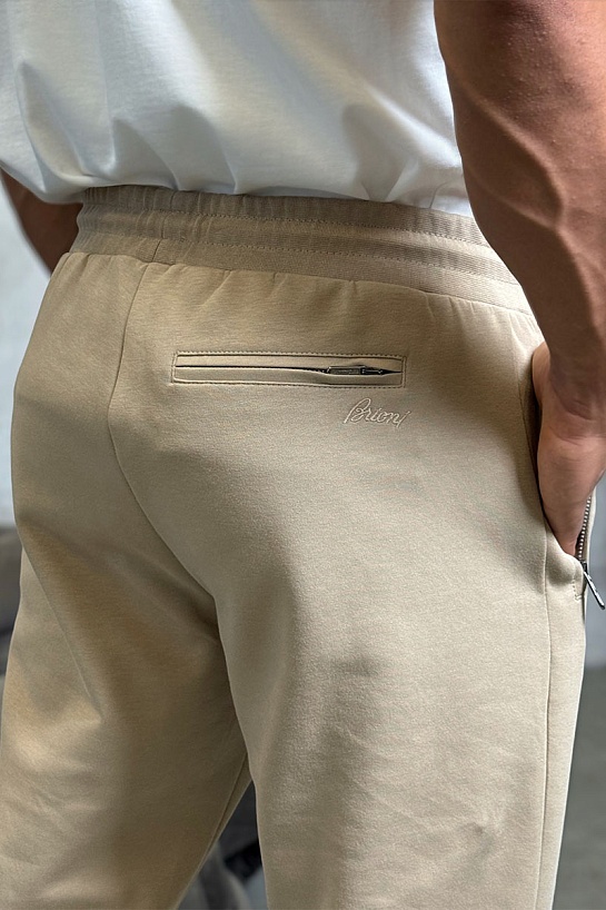 Бежевые спортивные штаны Brioni B-еmbroidery