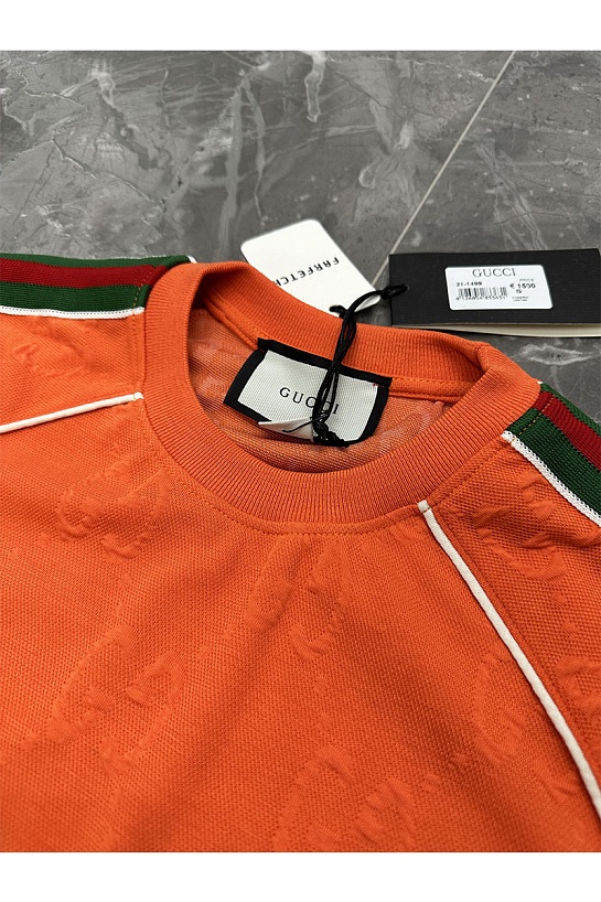 Оранжевая оверсайз футболка Gucci logo all-over embossed