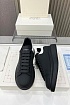 Кожаные кроссовки Alexander McQueen чёрного цвета