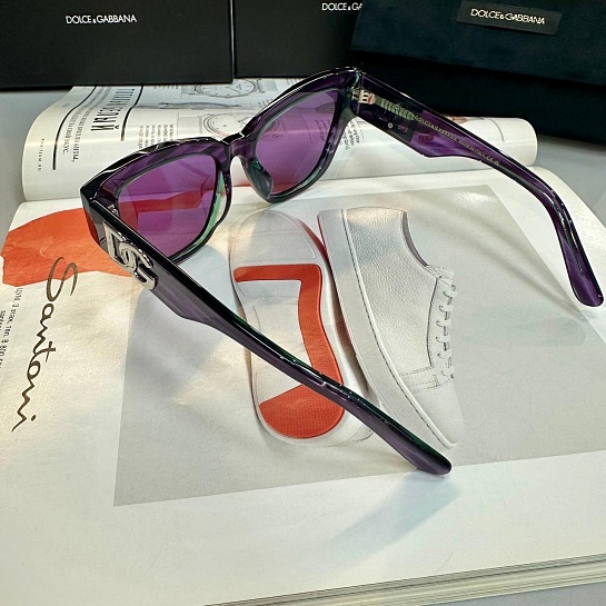 Женские сонцезащитные очки  Dolce & Gabbana фиолетового цвета