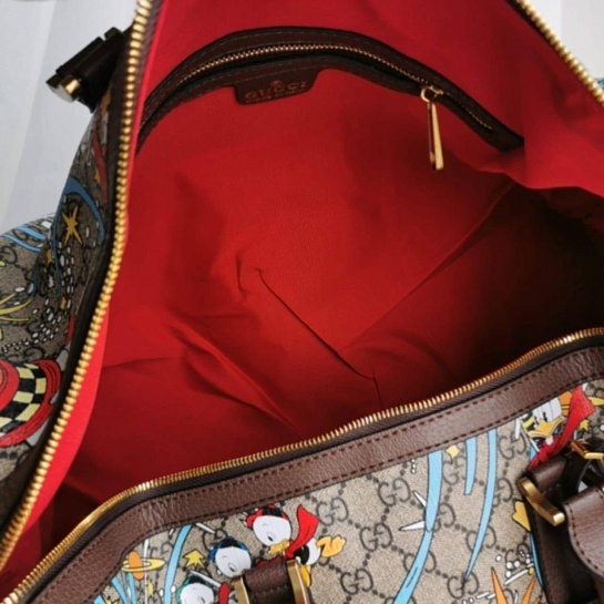 Дорожная кожаная сумка Gucci Disney GG Supreme 45x28 см