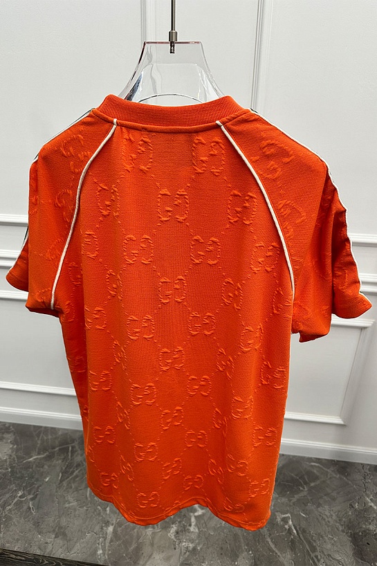 Оранжевая оверсайз футболка Gucci logo all-over embossed