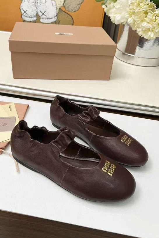 Женские кожаные балетки с круглым мысом MIU MIU