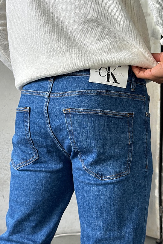 Джинсы синего цвета Calvin Klein