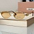 Женские солнцезащитные очки MIU MIU Oval